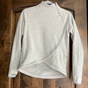 Athleta girl cozy soft sweatshirt. Light grey, fuzzy interior, thumbholes. 12